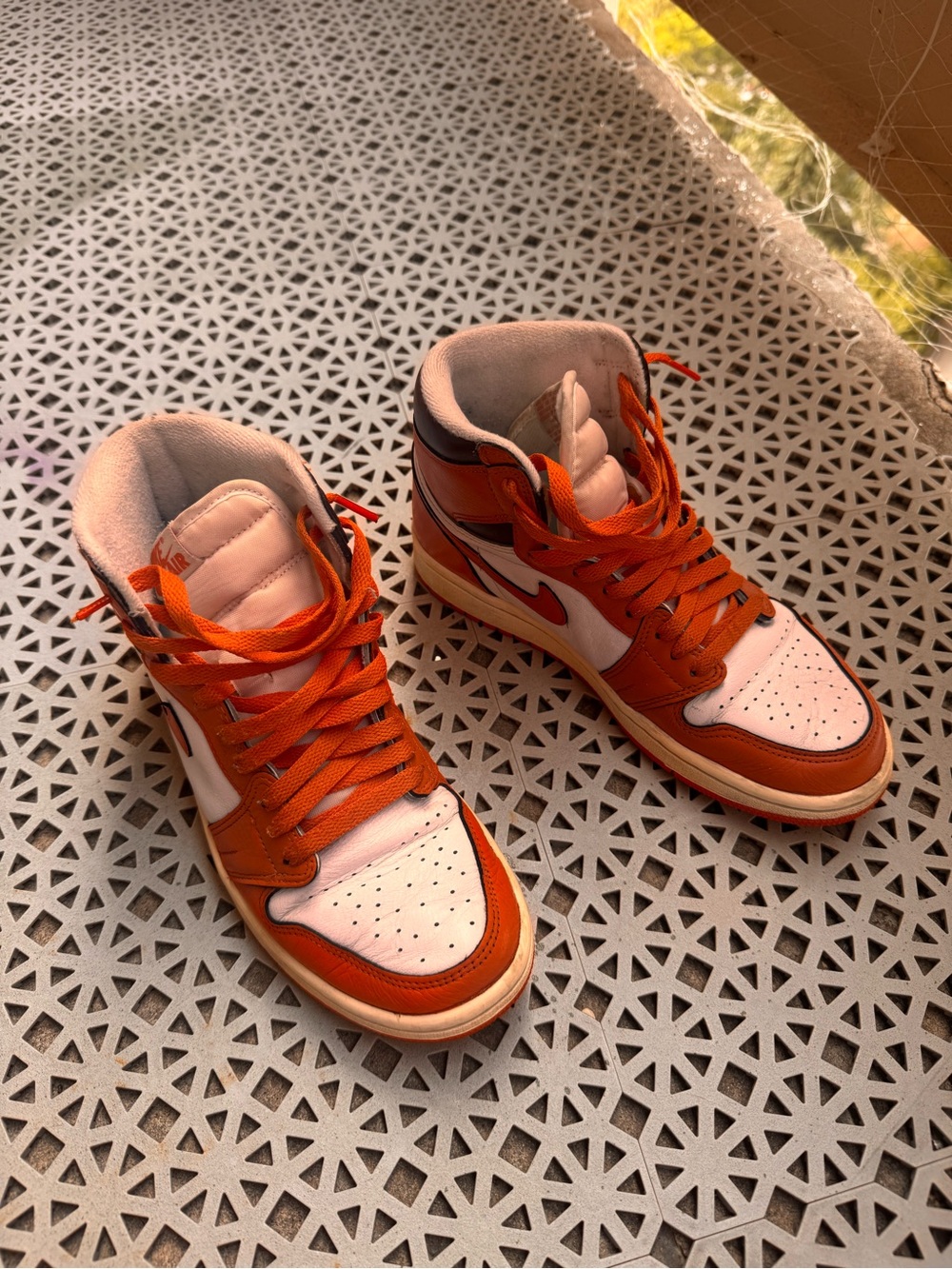 Nike Kids Orange and White Mid-Top Sneakers with Red Swoosh